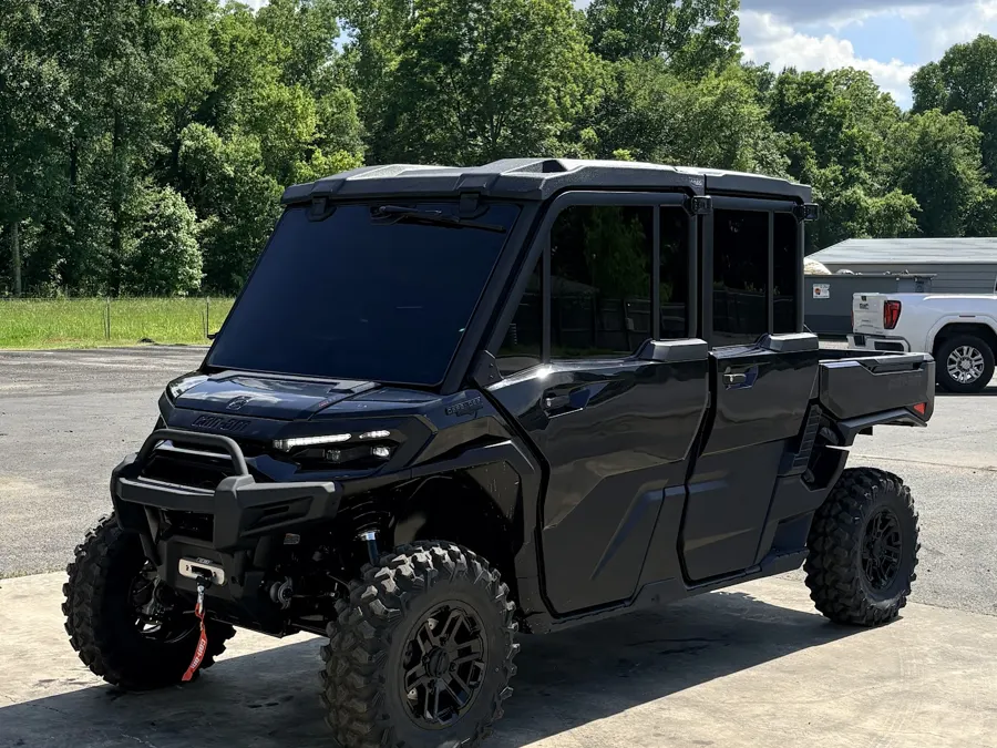 Black side-by-side UTV with tinted cab glass